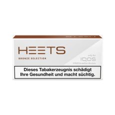 Packung Tabaksticks IQOS HEETS Bronze Selection 20 Stück. Graue Packung mit braunem Heets Logo.